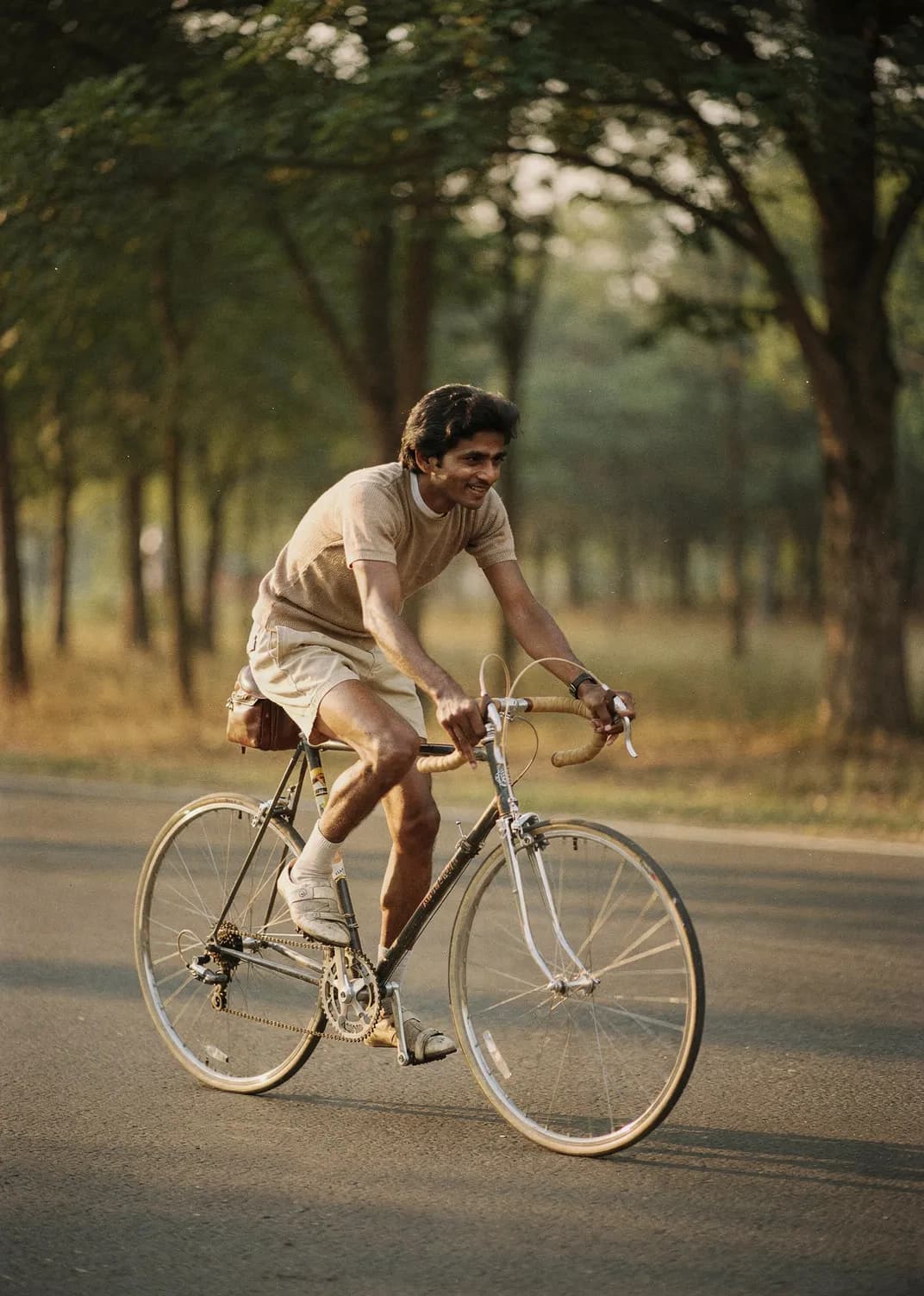 Cyclist rolling down a quiet country road